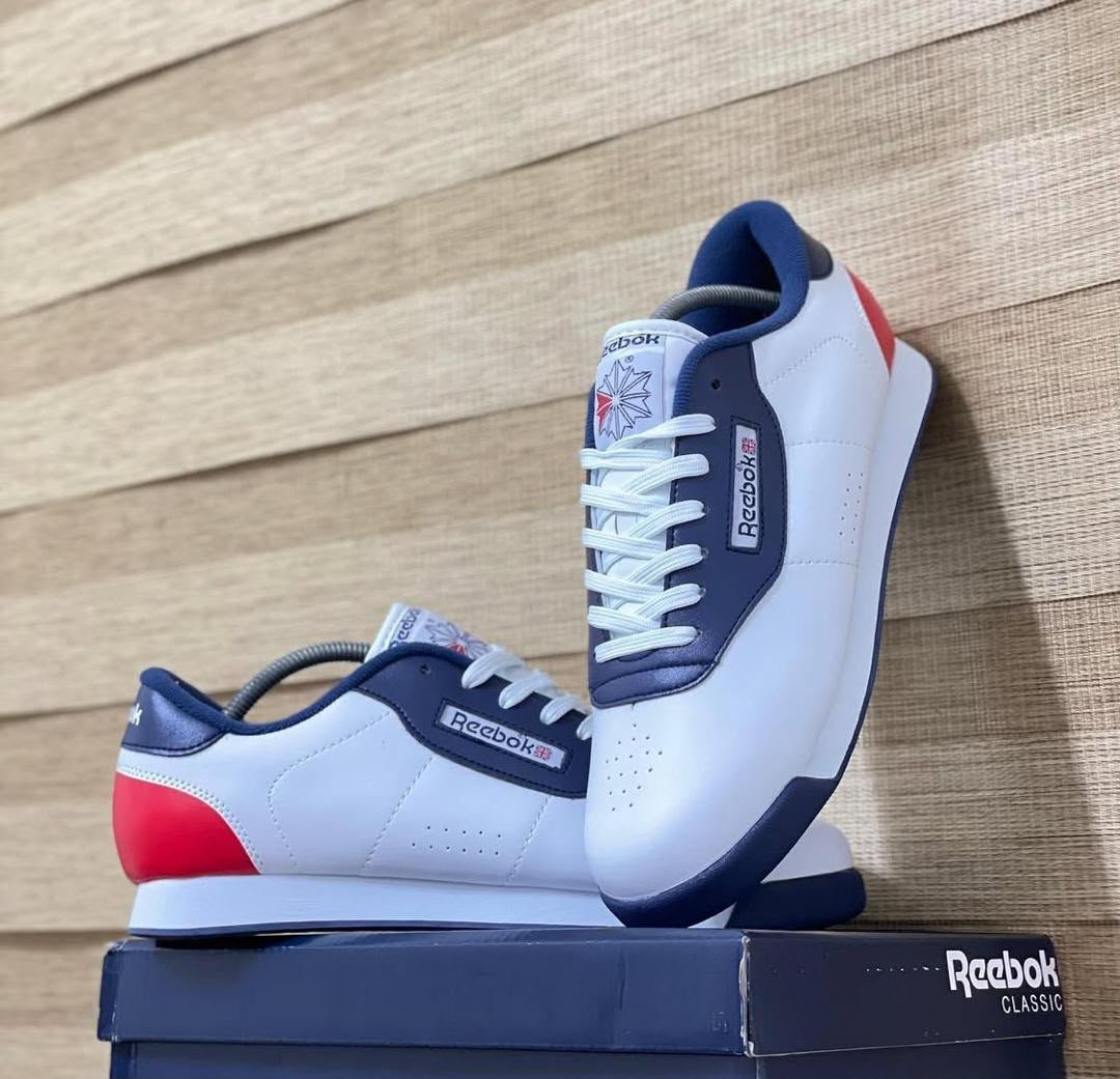 root-OxPK86.jpeg Reebok Classic White Navy Blue Red Sneakers - Luxury Footwear for Men - Image 1